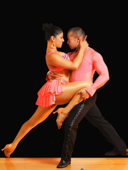 A snapshot from one of our professional photoshoots, capturing the intensity and elegance of a classic Salsa pose. This is the result of over 15 years of dedication, practice, and partnership.