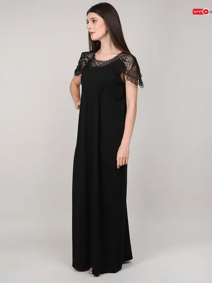 A side view of the black nightgown, providing a clear look at its silhouette and length.
