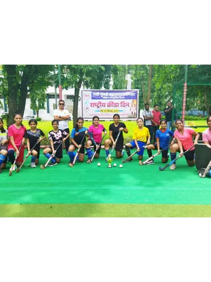 Our junior girls team celebrating National Sports Day on the field. We encourage our players to celebrate the spirit of sports and their love for hockey.