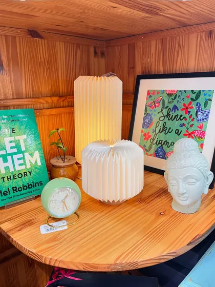 Another cozy nook created with my Enoki and Oyster paper-crafted lamps. They bring a soft glow to any space, alongside books and other treasures.