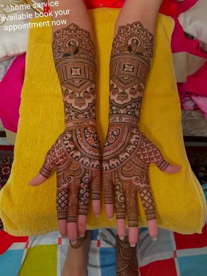 A beautiful, traditional design with portraits of gods and goddesses, personalized with names in Hindi. This is a very spiritual and meaningful choice for a bride.