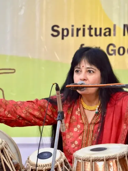 Performing at a 'Positive Weekends' concert. In these sessions, I often combine tabla with other small percussion instruments and even my voice to create a multi-layered, meditative sound experience for the audience.