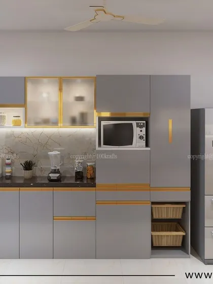 This image shows the tall unit in the 'Konark Oasis' kitchen, which seamlessly integrates the microwave and refrigerator, maintaining the sleek and minimalist aesthetic.