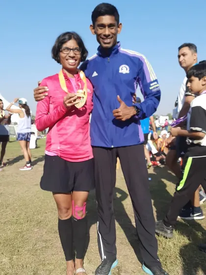 A proud moment with a fellow runner who achieved her Boston Qualification time. Her success is my success.
