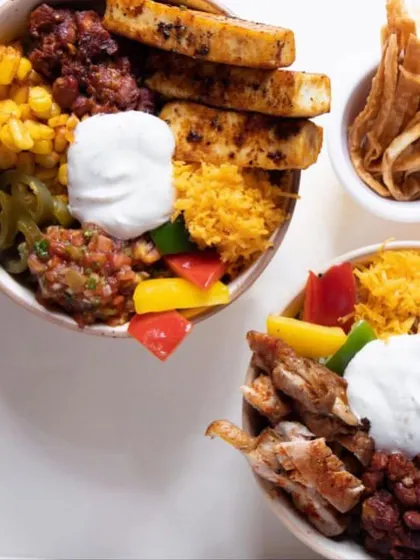 Wednesday meal inspiration. Can't decide between our paneer and chicken burrito bowls? Why not get both?