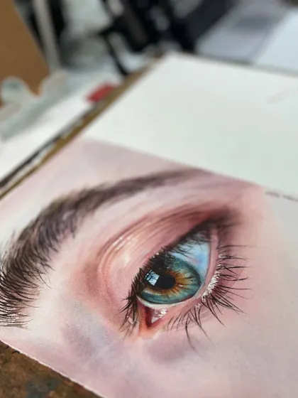 The eye is the window to the soul, and painting one in hyper-realism is a lesson in patience. This close-up from a workshop demonstration shows how layering watercolor washes can create depth, reflection, and life.