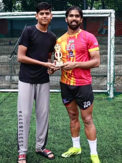 Our player receiving the Top Scorer award at the Clash of Champions.