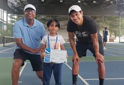 We are so proud of our student Rhythm from our Electronic City center. Here he is with his coaches after securing 3rd place in a competitive Red Ball tournament.