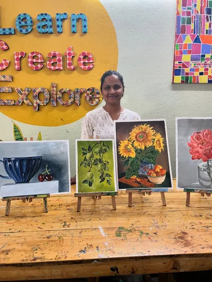 I love seeing my students' progress. This collection of still life paintings by one of my adult learners shows her journey in mastering acrylics. From understanding light on a simple cup to capturing the complex textures of sunflowers, each piece is a step forward in finding her unique artistic voice.