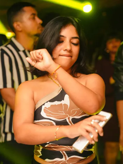 Feeling the beat and dancing with style.