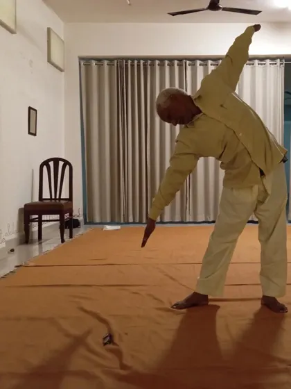 A standing side bend, part of a sequence to open up the sides of the body.