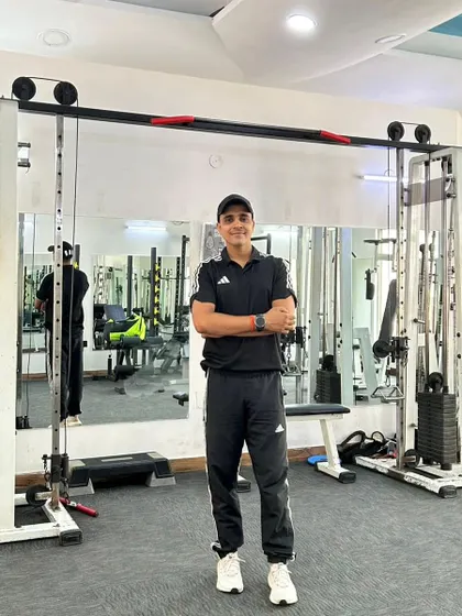 Standing ready in the gym, my primary place of work and passion.