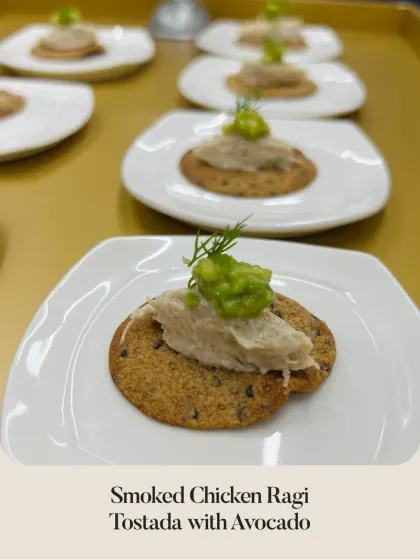 A Smoked Chicken Ragi Tostada with Avocado, combining smoky, creamy, and crunchy textures in one perfect bite.