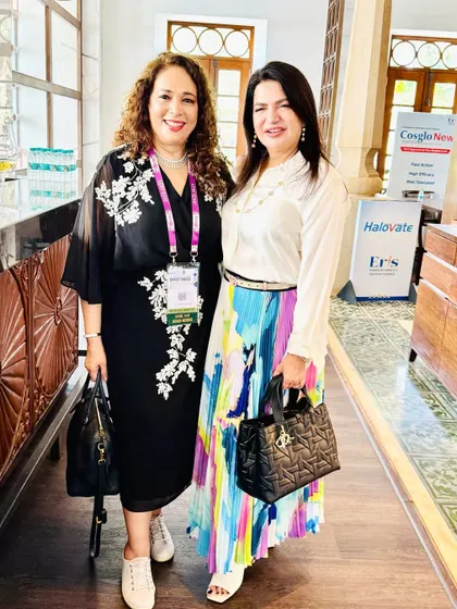 Networking with a fellow dermatologist at DICD 2025. These conversations often lead to new ideas and collaborations.