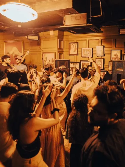 The crowd is the heart of the party. Everyone moving together to the beat.