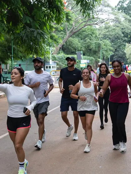 The vibe of running with a crew. A member captures a selfie during our group run, showing the fun and camaraderie of the Runners Club.