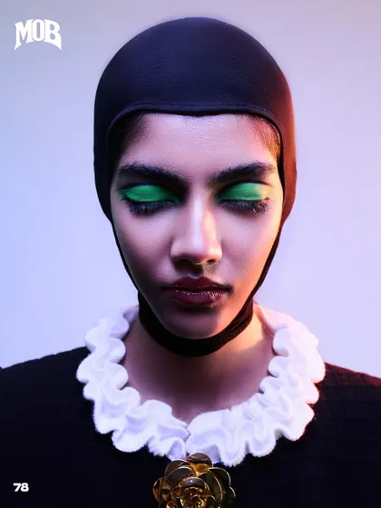 A beauty close-up from MOB Journal, highlighting the bold green eyeshadow.