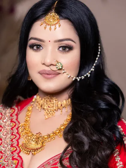 Another angle of this stunning student work. The focus is on flawless skin and beautifully blended makeup.