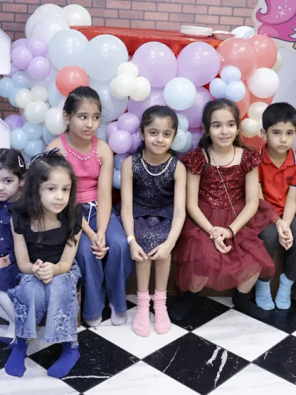 The whole birthday squad gathered for a group photo. Our party area can be set up to accommodate groups of all sizes.
