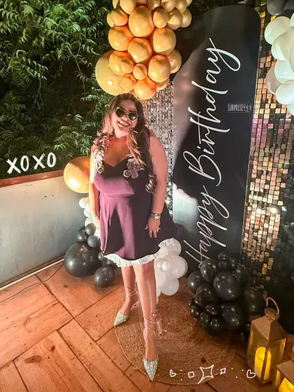 A bold and blingy birthday setup for a true diva. We used a power trio of gold, white, and black balloons against a shimmering backdrop to create a look that was pure glamour. The custom "Happy Birthday" signage added a personal touch to the outdoor celebration.