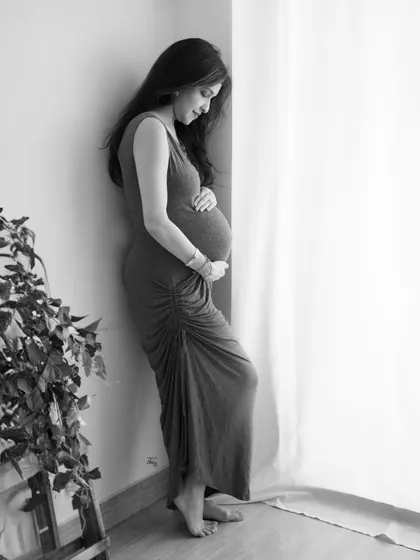 Another angle from this serene window-lit session. This black and white shot feels intimate and peaceful, a quiet moment captured forever.