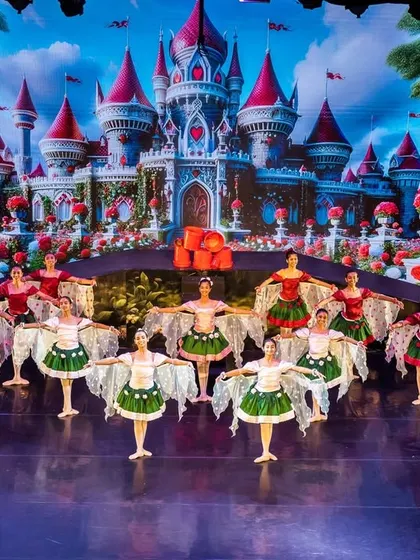 The Queen of Hearts' garden from "Alice in Wonderland." We design and execute every detail, from the vibrant costumes of the flower ensemble to the fairytale castle projected on the digital screen.