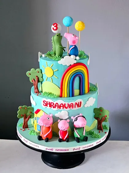 Bringing the world of Peppa Pig to life, this two-tiered cake is perfect for a child's birthday party. I hand-sculpted all the characters, including Peppa, George, and their friends, and set them in a cheerful scene with a bright rainbow and their iconic house. It’s a fun and vibrant cake that kids instantly recognize and love.