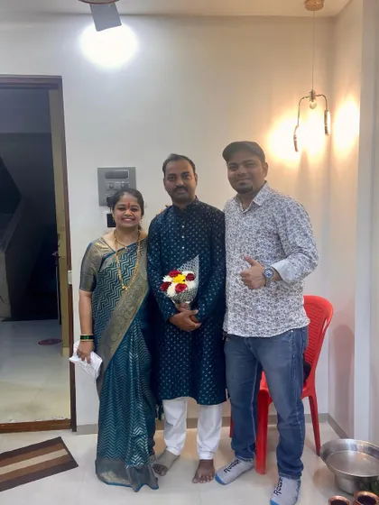With the Dumbre family at their housewarming ceremony in Kalyan West. Their happiness and satisfaction are the true measures of a project's success.