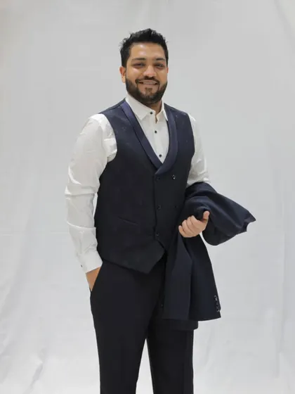 A more relaxed but still formal look with a waistcoat. This is a great option for keeping things sharp yet comfortable during a long night of music.