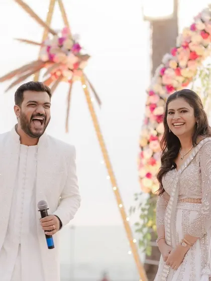 A candid shot of this beautiful engagement bride, laughing and enjoying her special day. Her makeup was kept fresh and luminous to let her natural radiance shine through in her all-white ensemble.