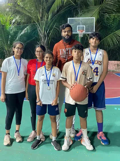 A team from the U-16 category at "The Carnival" with their coach and medals. We are proud of all our players' efforts.