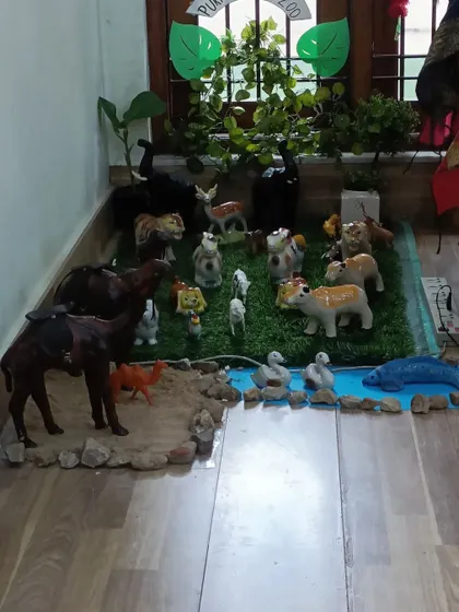 A miniature zoo setup as part of our Dussehra 'Gombe Habba' (display of dolls) tradition. This activity combines cultural celebration with learning about animals.