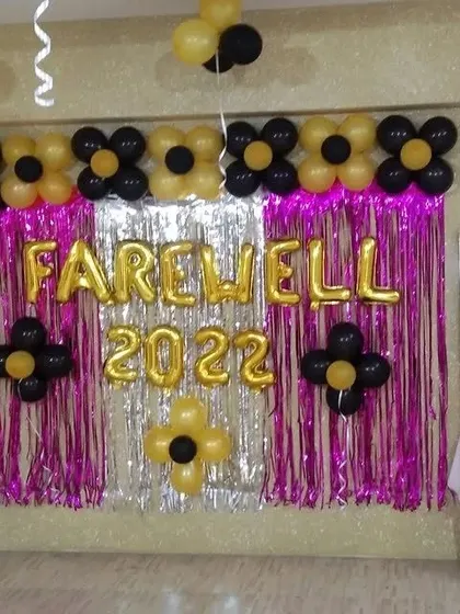 This image captures the full 'Farewell 2022' setup, providing a clear example of a budget-friendly and cheerful decoration option for office milestones.