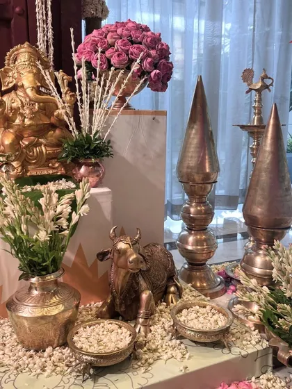 A sacred corner for new beginnings. I arranged traditional brass elements, a Ganesha idol, and fresh white and pink flowers to create a beautiful and auspicious display.