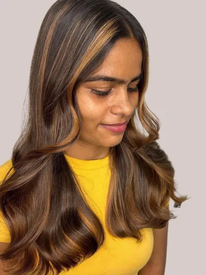 A profile view of the Brown Sugar look, showing how the highlights frame the face and add dimension.