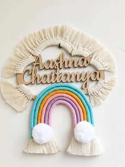 I love creating personalized pieces like this custom rainbow name hanging for a child's room. We can work together to choose the colors and name to create a truly unique and cherished piece of macrame wall decor.