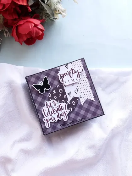 The cover of the mini album, decorated with "Let's celebrate your day" and a butterfly embellishment.