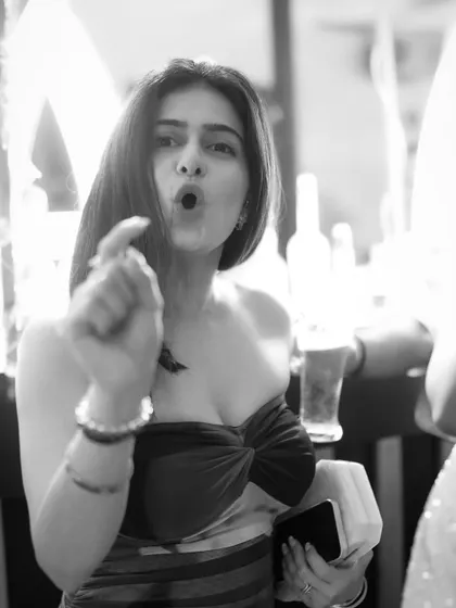 A fun and expressive candid of a guest. Black and white photography is perfect for capturing raw personality and energy.