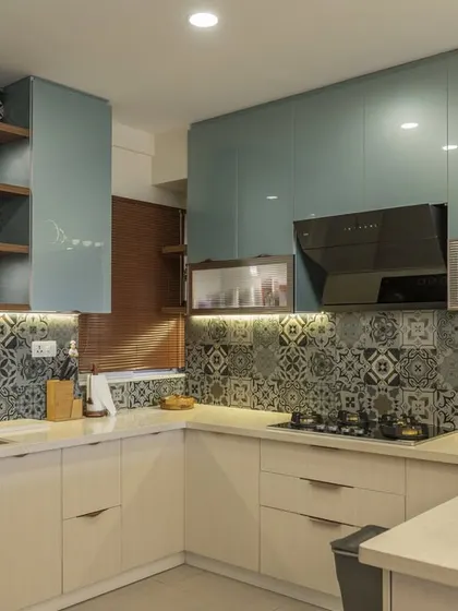 This angle shows the breakfast bar, which provides a casual dining spot and helps to define the kitchen area in an open-plan space.