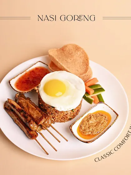 Influenced by Chinese immigrants, Nasi Goreng is Indonesia's take on fried rice. My version gets its sweet and savory profile from kecap manis and is a perfect meal for a hectic day.