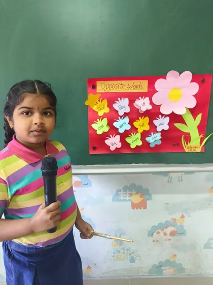 This student created a beautiful chart to explain opposite words, using colorful butterflies to make the concept engaging and easy to understand.