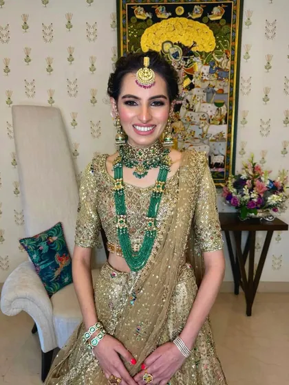 A happy and radiant bride, her traditional look is both timeless and stunning.
