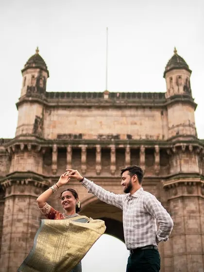 A playful dance in front of the Gateway of India, this pre-wedding photo is full of life and captures the spirit of Mumbai.