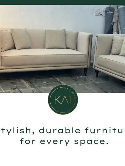 A classic sofa design with refined piping and nailhead details, shown in our workshop. This image highlights the traditional craftsmanship techniques we employ to ensure durability and timeless style.