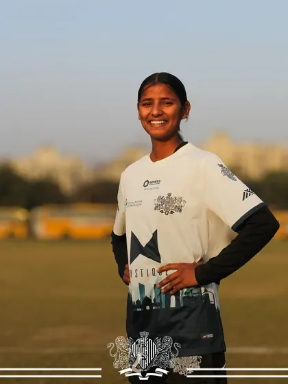 A confident smile from one of our star players. Her journey is an inspiration to young girls aspiring to play football at a professional level.