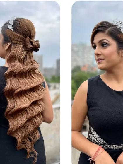 A real-world example of our training, this model showcases a beautiful half-up bow style with crimped waves.