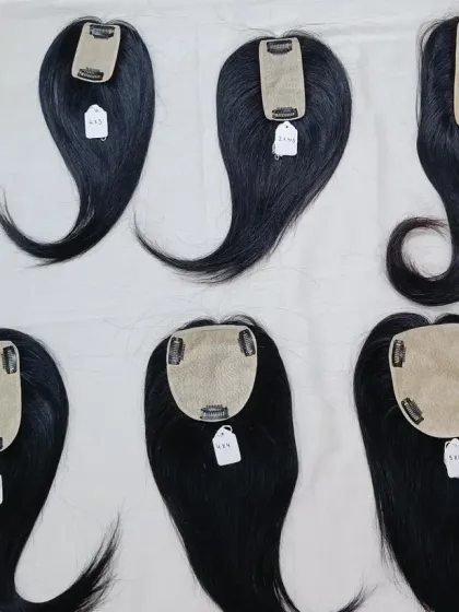 I offer hair toppers in all sizes to ensure a perfect fit and the right amount of coverage for every client.