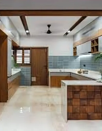 A U-shaped kitchen with a peninsula counter that features a unique textured wood finish. This design element adds a tactile and visual point of interest.