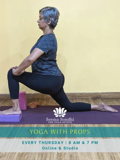 Yoga with props is a wonderful way to deepen your practice. Here, I am in a low lunge, using a block under my front foot for stability, which allows me to focus on opening my hips.