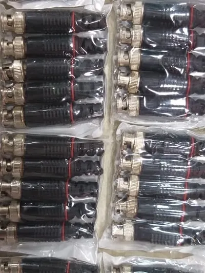 Packets of BNC connectors used for analog and HD-TVI camera installations.